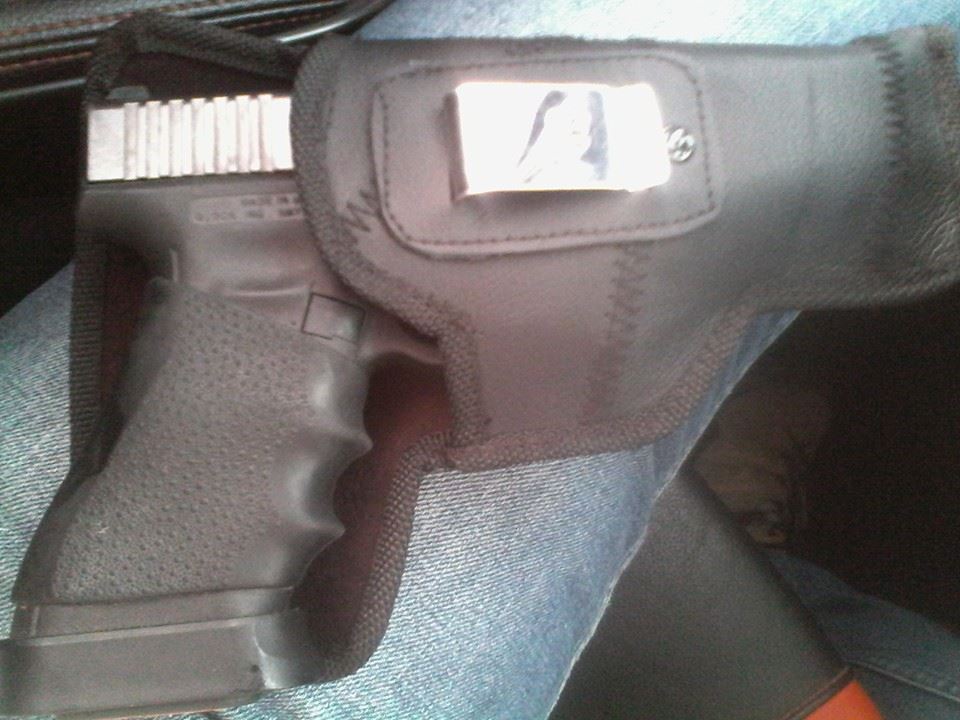 glock 17 gen 4 side view on a holster.jpeg