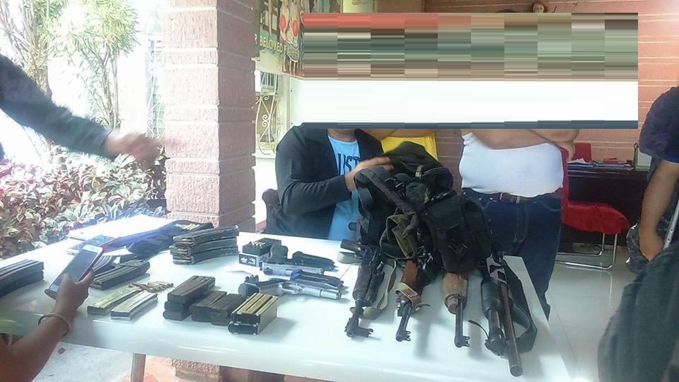 high powered firearms recovered on top of table.jpeg